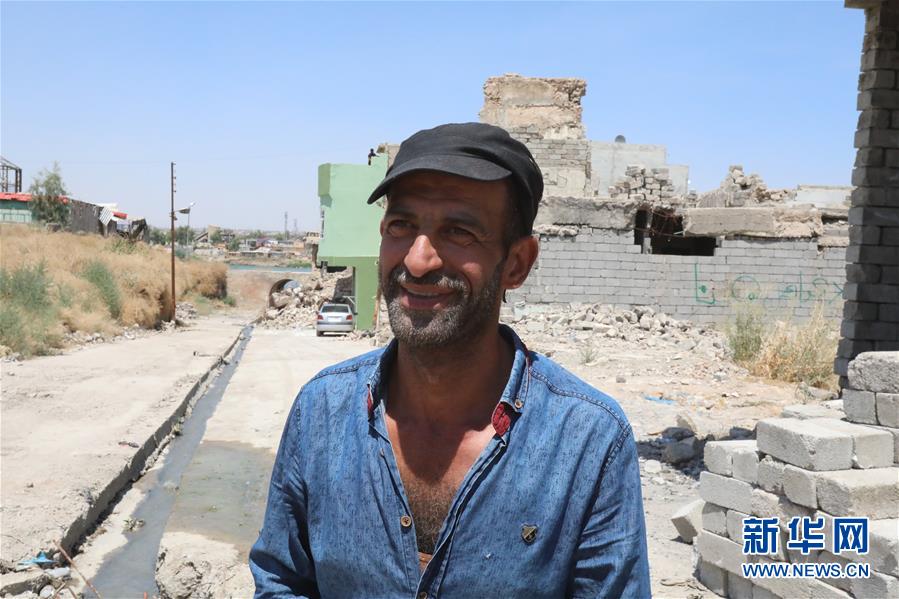 (國際·圖文互動(dòng))(4)通訊:中企員工愛心捐款助摩蘇爾老城民眾重燃生活希望