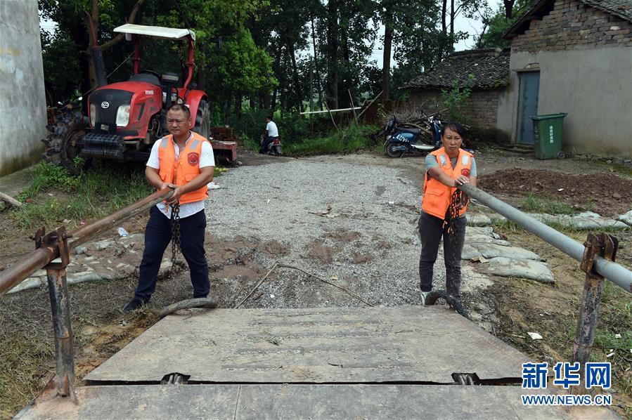 (新華全媒頭條·圖文互動)(7)筑起共御水患的鋼鐵長堤——戰(zhàn)洪一線的“干群關(guān)系新答卷”