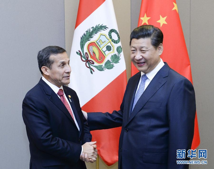 7月16日，國家主席習(xí)近平在巴西首都巴西利亞會見秘魯總統(tǒng)烏馬拉。新華社記者 劉建生 攝 