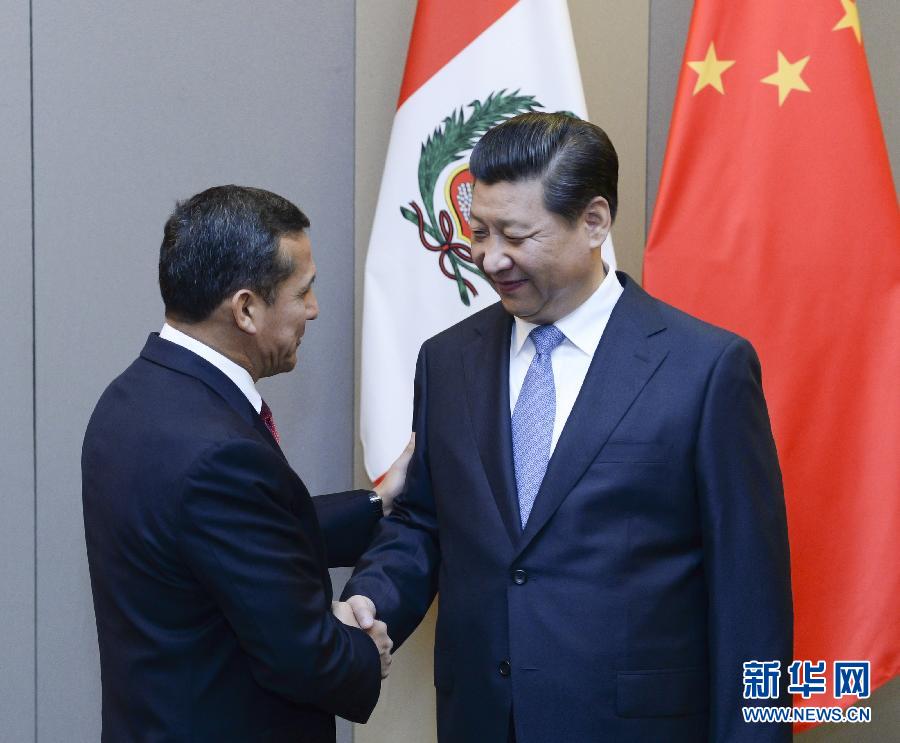 7月16日，國家主席習(xí)近平在巴西首都巴西利亞會見秘魯總統(tǒng)烏馬拉。新華社記者 劉建生 攝 