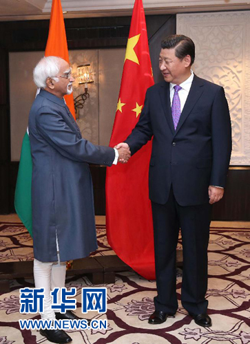 9月18日，國家主席習(xí)近平在新德里會見印度副總統(tǒng)兼聯(lián)邦院議長安薩里。 新華社記者 龐興雷 攝