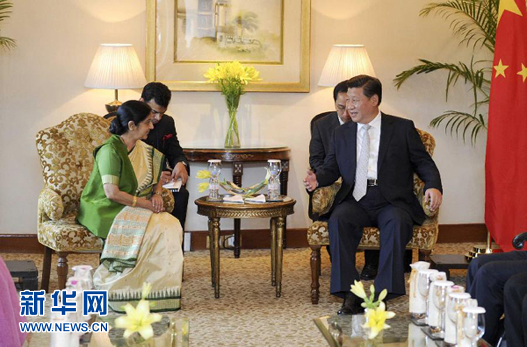 9月18日，國家主席習(xí)近平在新德里會見印度外長斯瓦拉杰。新華社記者 張鐸 攝