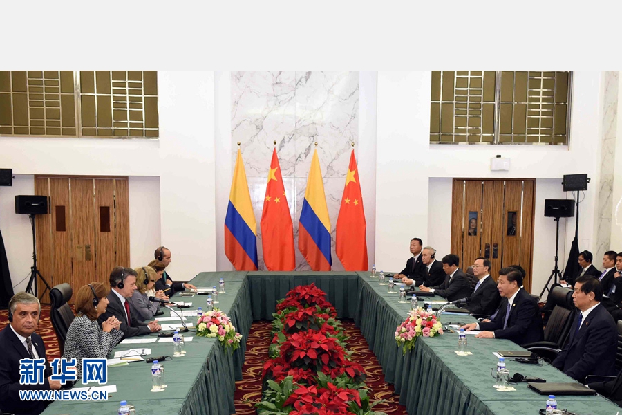 11月18日，國家主席習(xí)近平在菲律賓馬尼拉會見哥倫比亞總統(tǒng)桑托斯。 新華社記者 饒愛民 攝