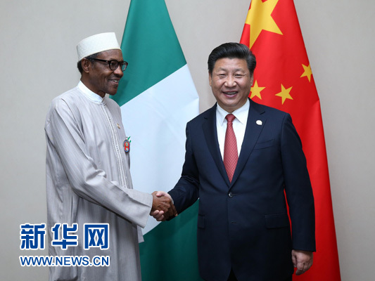 12月4日，國(guó)家主席習(xí)近平在約翰內(nèi)斯堡會(huì)見(jiàn)尼日利亞總統(tǒng)布哈里。 新華社記者 龐興雷 攝 