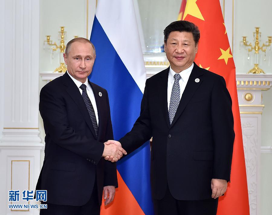6月23日，國(guó)家主席習(xí)近平在烏茲別克斯坦塔什干會(huì)見俄羅斯總統(tǒng)普京。新華社記者李濤攝