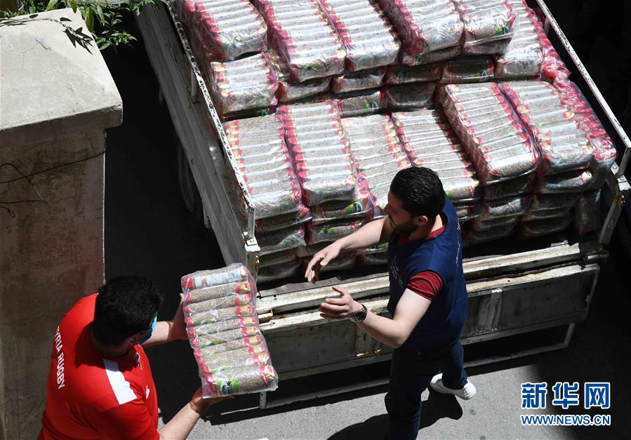 （國(guó)際疫情&middot;圖文互動(dòng)）（1）通訊：疫情中，那抹笑容最難忘&mdash;&mdash;記向困難家庭發(fā)放愛心包裹的敘利亞青年志愿者