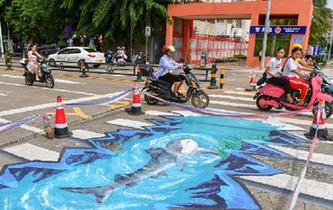 &ldquo;海洋世界&rdquo;3D立體斑馬線亮相?？? />  
<div>“海洋世界”3D立體斑馬線亮相海口</div>
</a> 
</div>
<div   id=